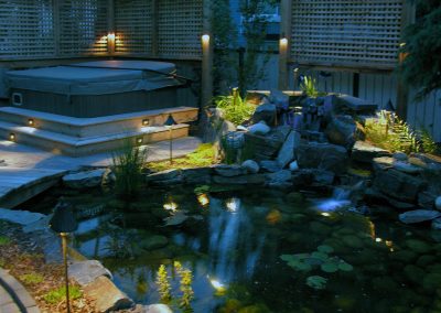 night lighting landscape design patio stairs courtyard koi pond water feature